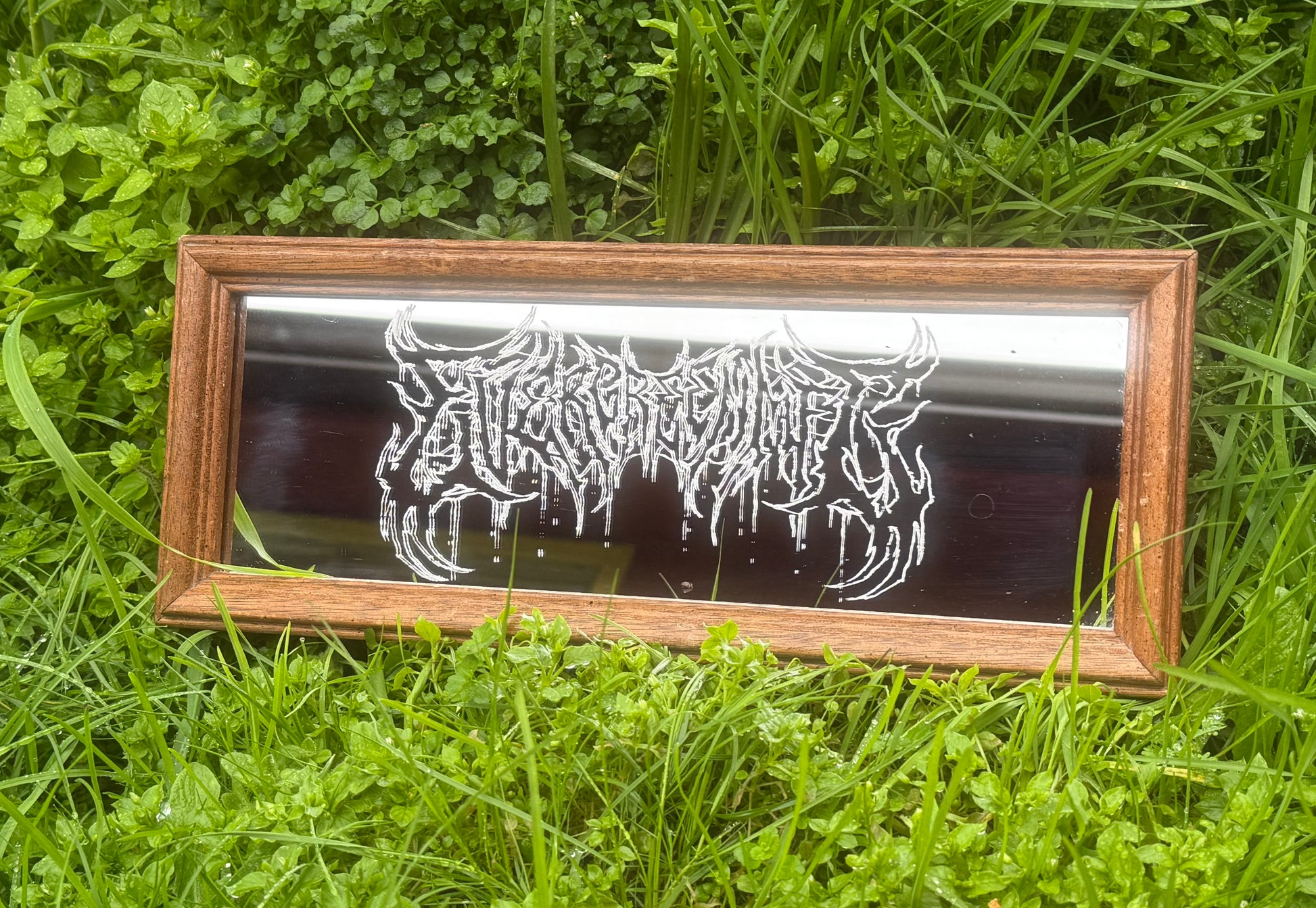 Wooden framed etched mirror in clover